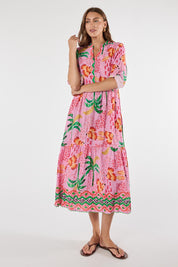 Model Genericm wearing size sample of the Yasmin Midi Dress – Musk in colour Musk, from the front