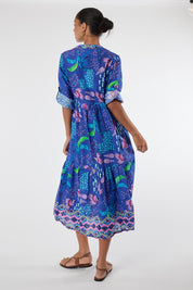 Model Genericm wearing size sample of the Yasmin Midi Dress – Ocean in colour Ocean, from the front