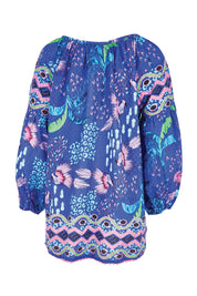 Product shot of the Yasmin Top – Ocean in colour Ocean, from the back