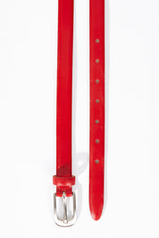 A model wearing size XS of the Work It Belt in colour Red (Red), from the front, showing the whole outfit