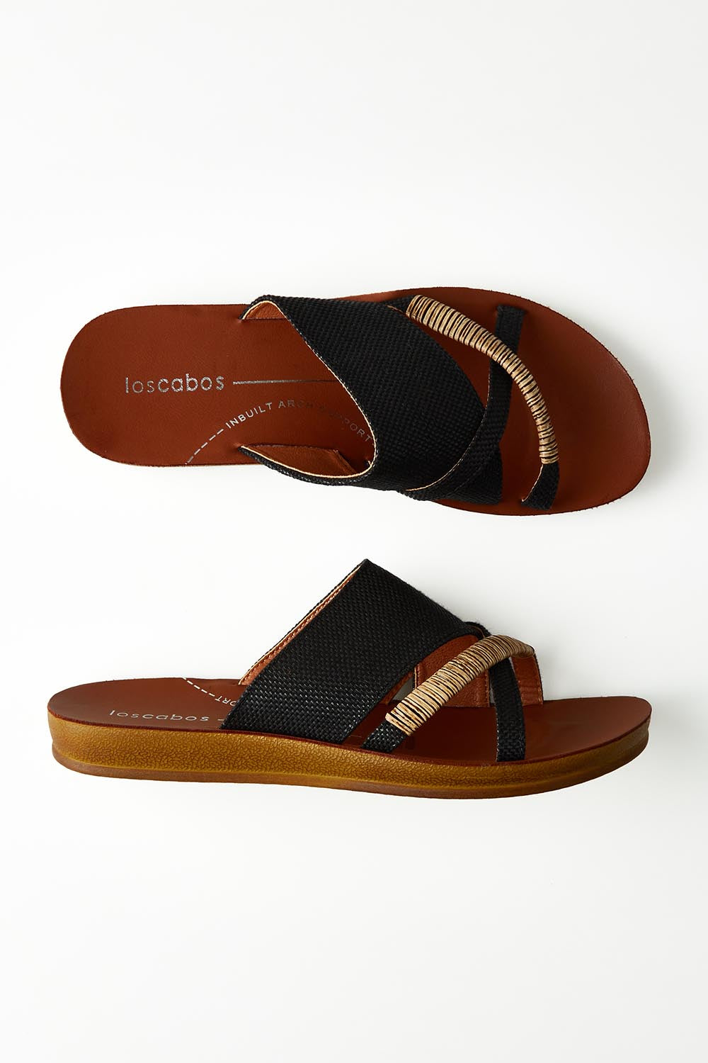 A model wearing size 37 of the Bride Slide in colour Blackraff (Black), from the front, showing the whole outfit