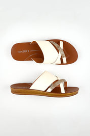 A model wearing size 37 of the Bride Slide in colour Bone, from the front, showing the whole outfit