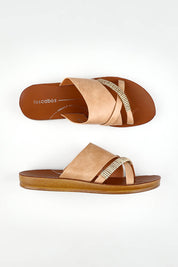 A model wearing size 37 of the Bride Slide in colour Camel, from the front, showing the whole outfit