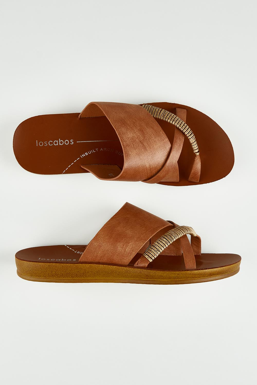 A model wearing size 37 of the Bride Slide in colour Chocolate, from the front, showing the whole outfit