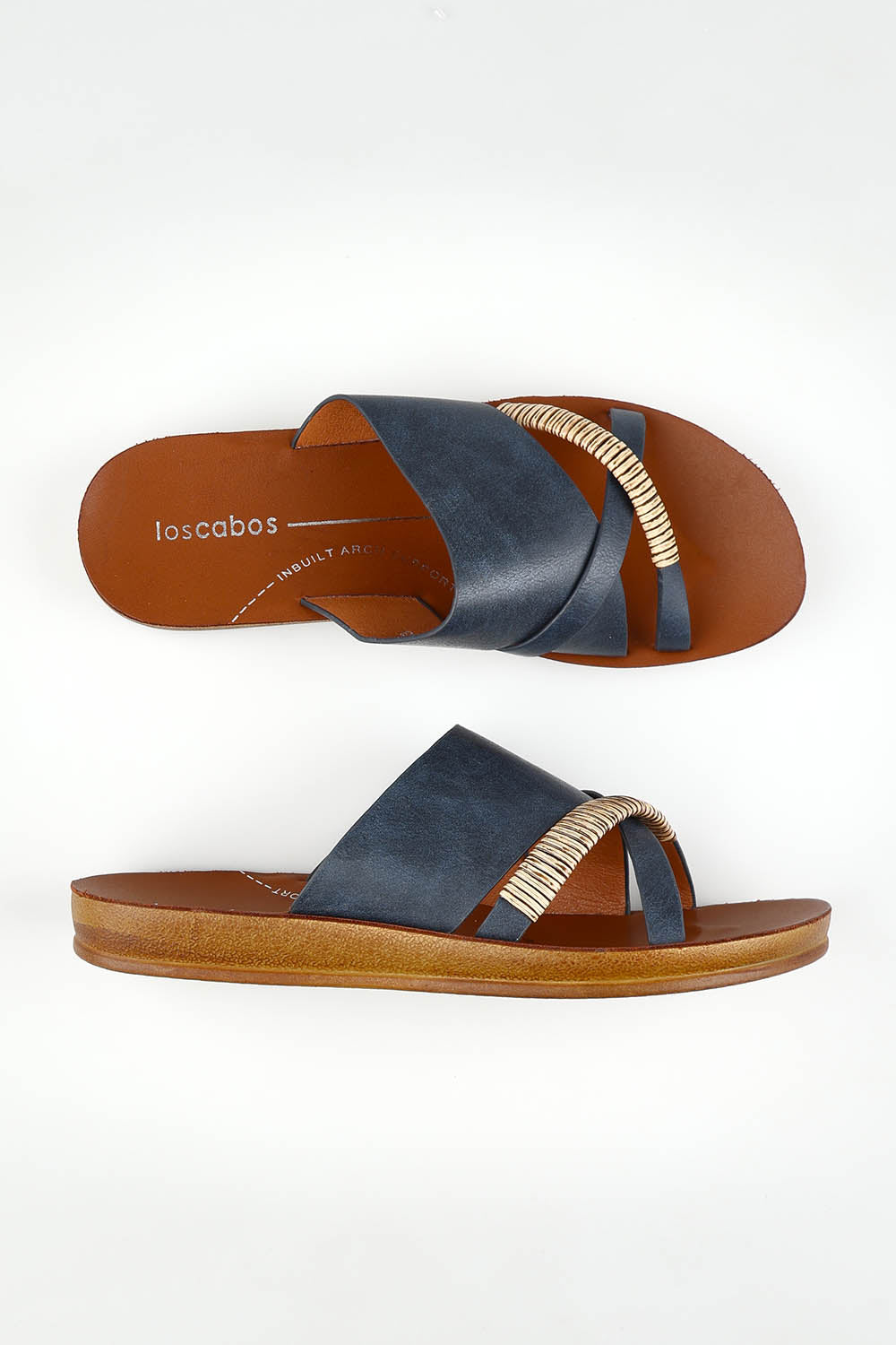 A model wearing size 37 of the Bride Slide in colour Navy (Blue), from the front, showing the whole outfit
