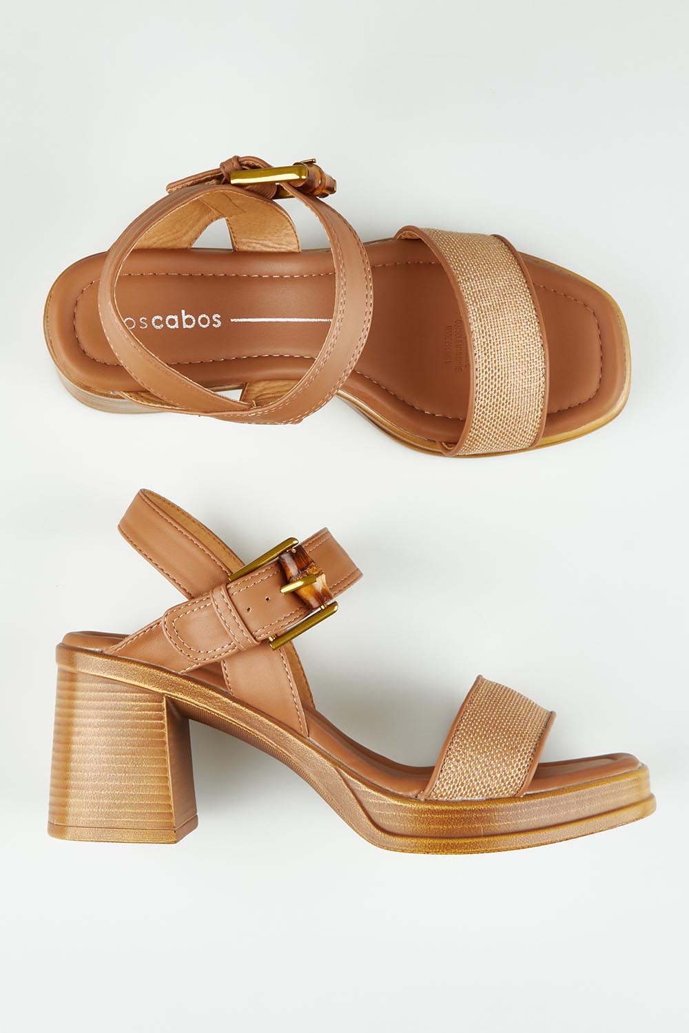 A model wearing size 37 of the Burgos Heel in colour Caramel, from the front, showing the whole outfit