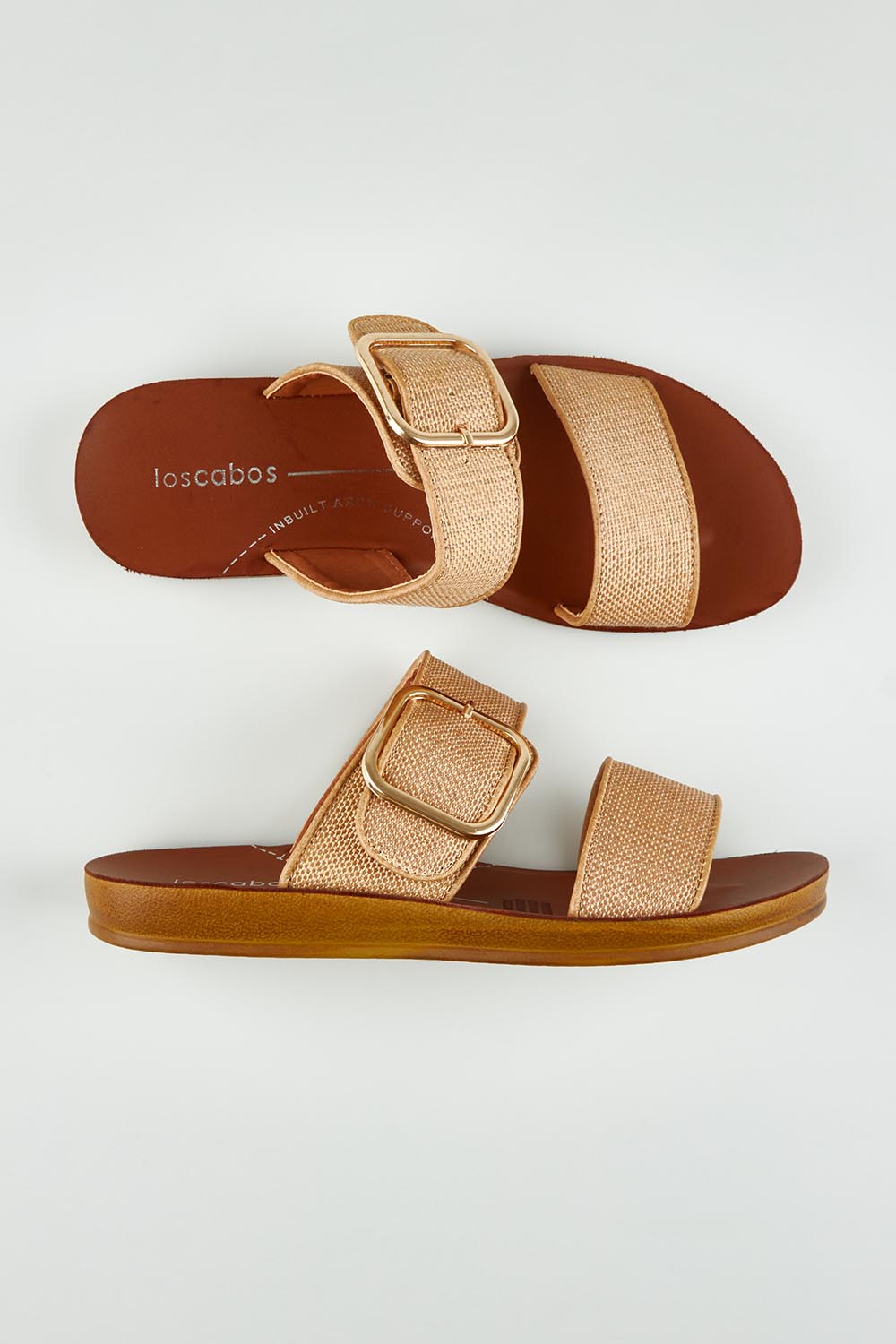 A model wearing size 37 of the Doti Double Strap Slide in colour Caramelraf, from the front, showing the whole outfit