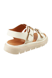 Product shot of the Toli Flatform in colour Bone (White), from the back