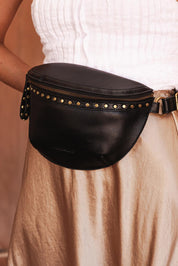 A model wearing the Cassidy Belt Bag in colour Black (Black), from the front, showing the whole outfit