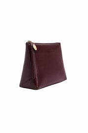 Product shot of The Everyday Pouch in colour Burgundy (Red), detail