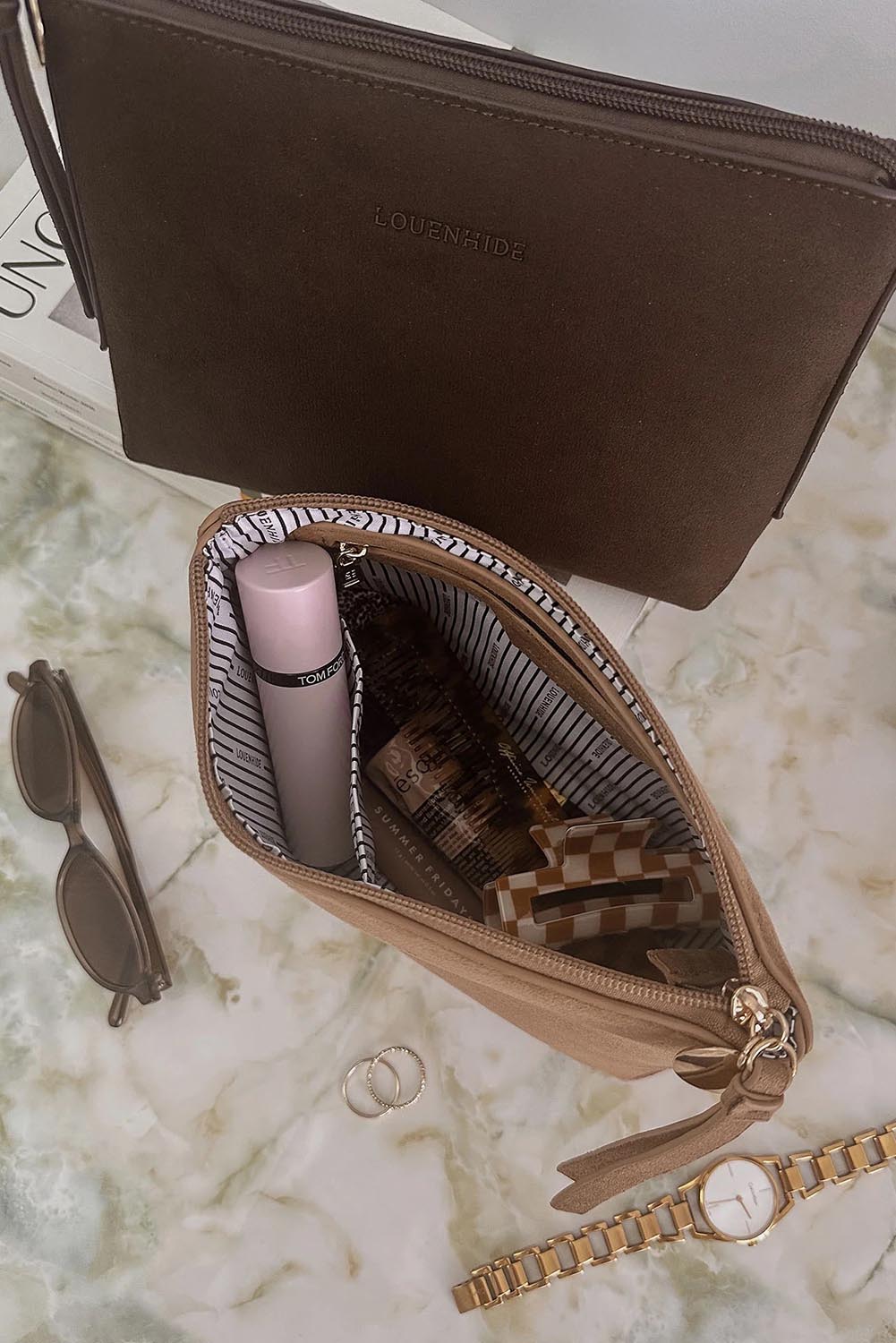 A model wearing The Everyday Pouch in colour Chocsuede, from the front, showing the whole outfit