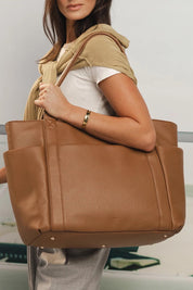 Model Genericm wearing size sample of the Chicago Tote Bag - Nutmeg in colour Nutmeg, from an angle