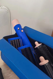 A model wearing the Margot Hot Tool Case in colour Royalblue (Blue), from the front, showing the whole outfit