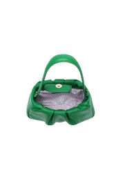 Product shot of the Uma Day Night Crossbody Bag in colour Emerald (Green), detail