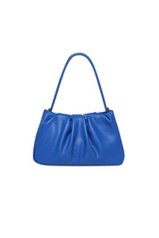 Product shot of the Uma Day Night Crossbody Bag in colour OceanBlue (Blue), from the back