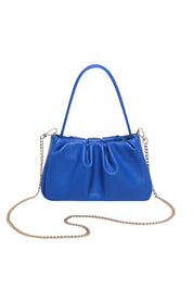 Product shot of the Uma Day Night Crossbody Bag in colour OceanBlue (Blue), from the front