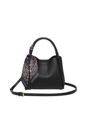 Product shot of the Steffie Mini Tote Bag - Black in colour Black, from the front