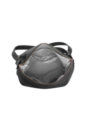 Product shot of the Miley Convertible Backpack - Black in colour Black, from the back