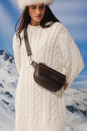 Model Genericm wearing size sample of the Lola Belt Bag - Chocolate in colour Chocolate, from an angle