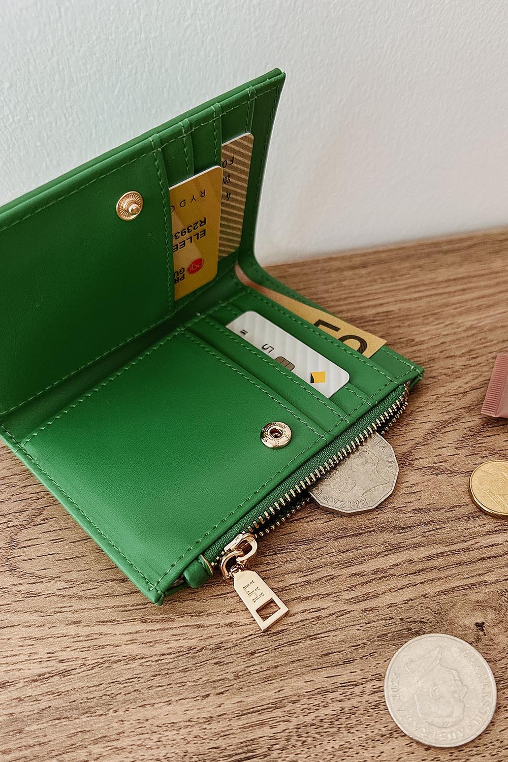 Product shot of the Lily Wallet - Applegreen in colour Applegreen, showing detail