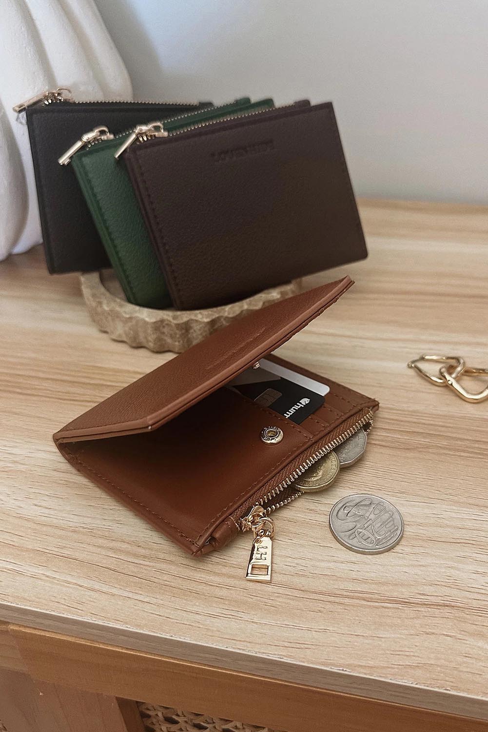 Product shot of the Lily Wallet - Black in colour Black, showing detail