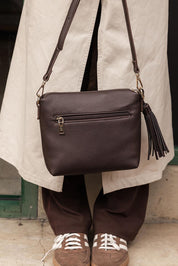 Product shot of the Kasey Crossbody Bag - Chocolate in colour Chocolate, showing detail