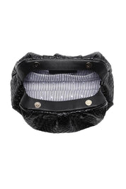 Product shot of the Macy Woven Clutch in colour Black (Black), detail
