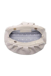Product shot of the Macy Woven Clutch in colour Malt, detail