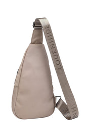 Product shot of the Boyd Nylon Sling Bag in colour Beige, from the back