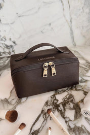 Product shot of the Ellis Makeup Bag - Chocolate in colour Chocolate, from the front