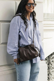Product shot of the Yumi Crossbody Bag - Chocolate in colour Chocolate, from the back