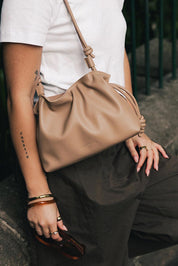 Product shot of the Yumi Crossbody Bag - Nude in colour Nude, showing detail