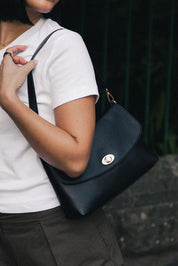 Product shot of the Nisha Shoulder Bag - Black in colour Black, showing detail