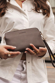 Product shot of the Poppy Clutch - Chocolate in colour Chocolate, from the front