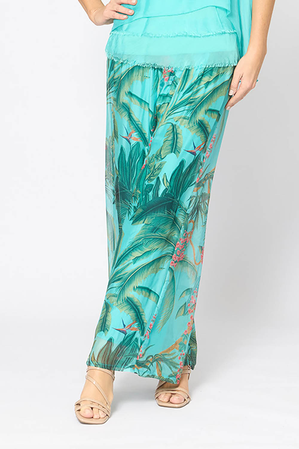 Model Genericm wearing size sample of the Silk Blend Printed Pant - Acquagarden in colour Acquagarden, in a cropped view