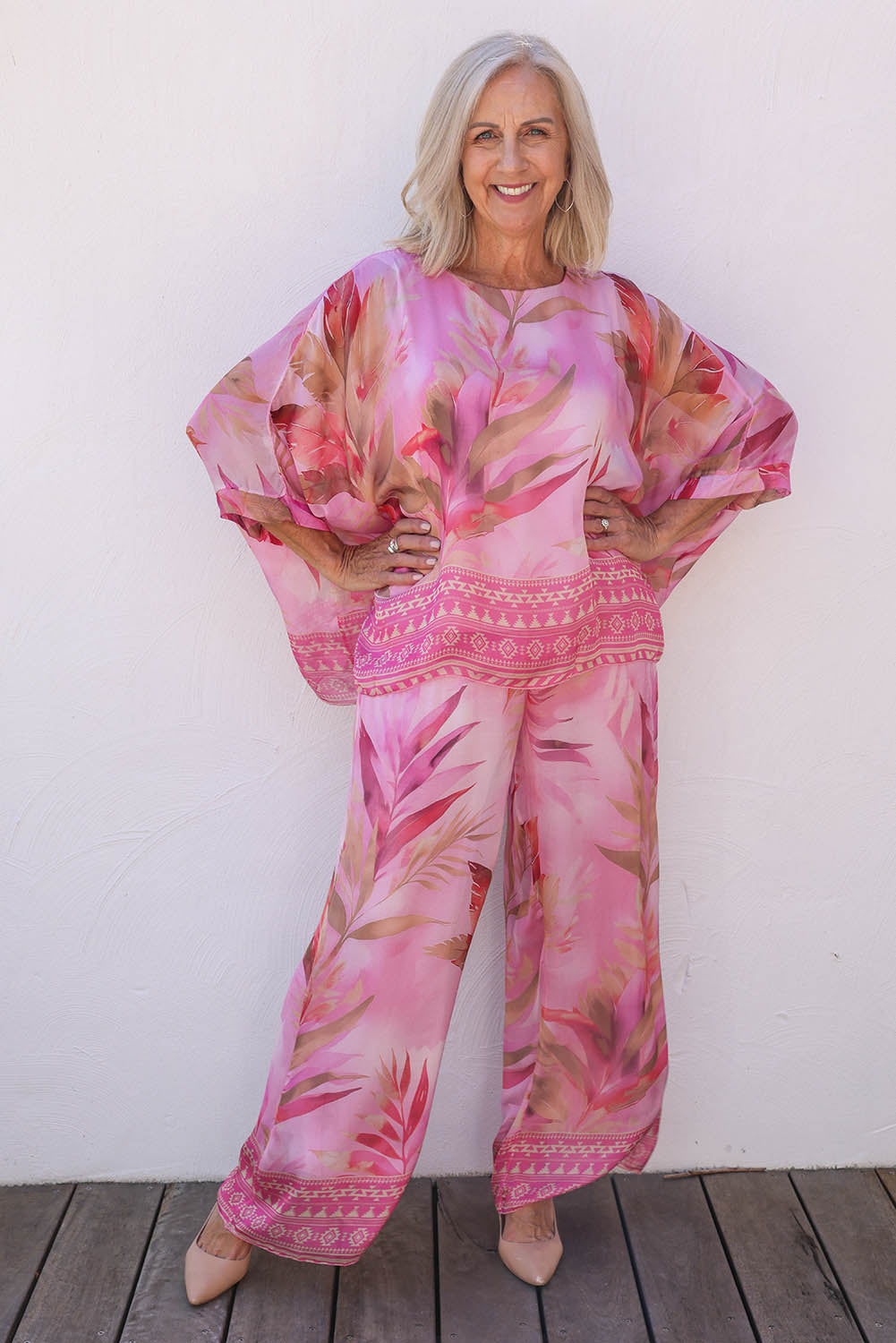 Model Sandy wearing the Silk Blend Printed Kaftan Top in colour Pinkprint (Pink), from the front, showing the whole outfit