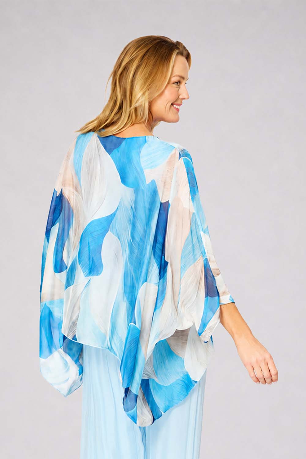 Model Genericm wearing size sample of the Silk Blend Printed Kaftan Top - Celesteabstract in colour Celesteabstract, from an angle
