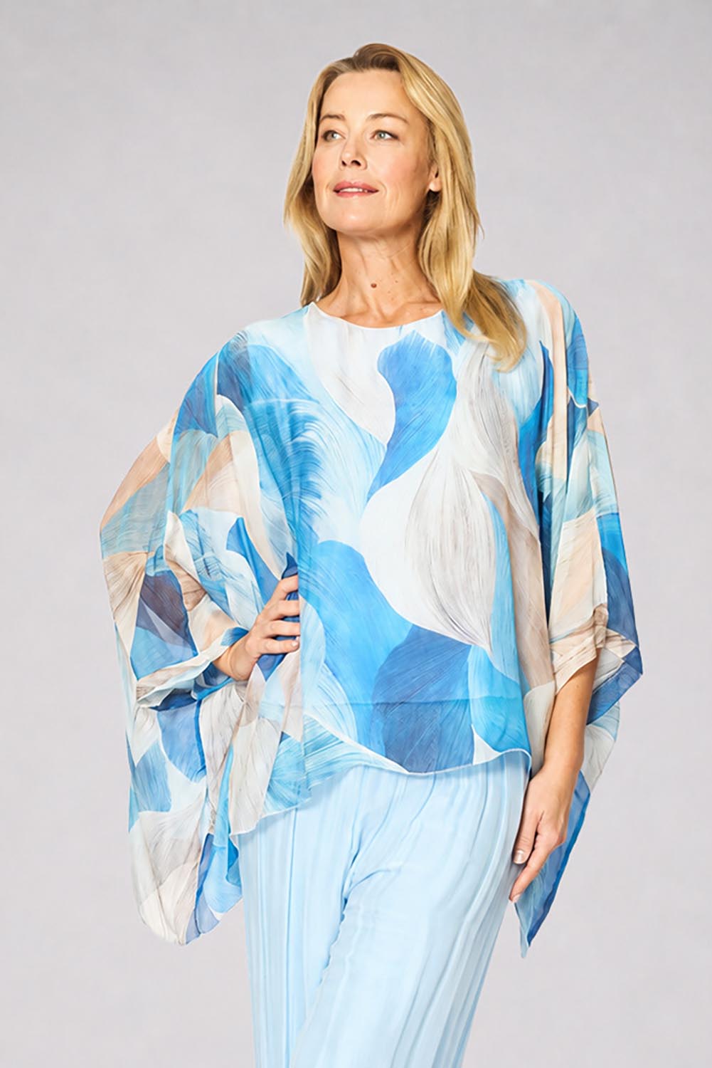 Model Genericm wearing size sample of the Silk Blend Printed Kaftan Top - Celesteabstract in colour Celesteabstract, from an angle