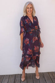 Model Sandy wearing the Frill Sleeve Silk Blend Print Dress in colour Orchidea (Purple), from the front, showing the whole outfit