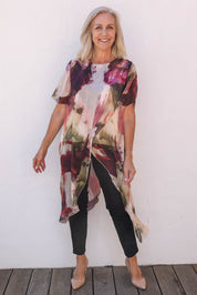 Model Sandy wearing the Silk Blend Overlay Top in colour Beigeprint, from the front, showing the whole outfit