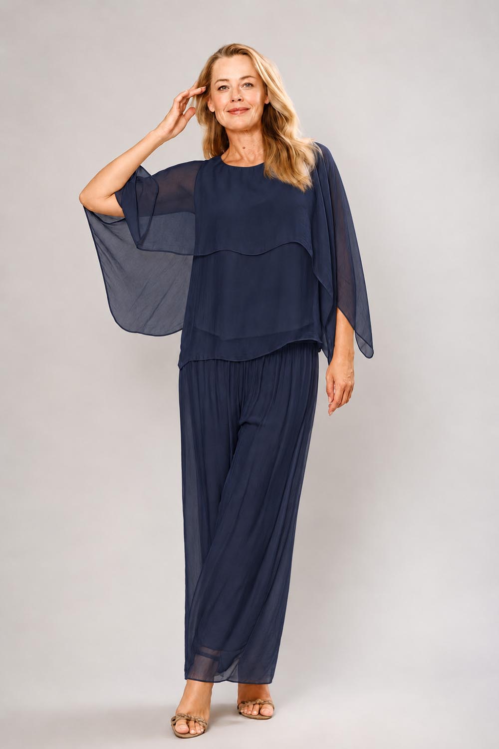 Model Genericm wearing size sample of the Silk Blend Cape Top - Navy in colour Navy, from the front