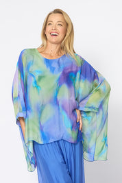 Model Genericm wearing size sample of the Silk Blend Printed Kaftan Top - Cobaltprint in colour Cobaltprint, in a cropped view