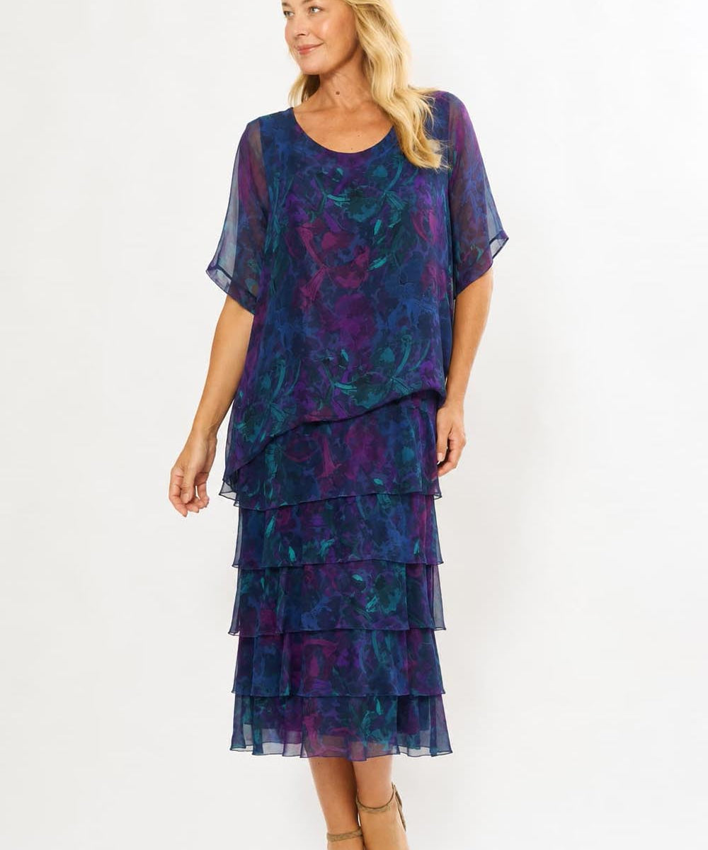 Model Genericm wearing size sample of the Silk Blend Multi Layers Dress - Navyfloral in colour Navyfloral, from the front