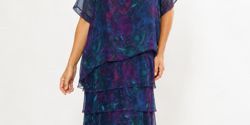 Model Genericm wearing size sample of the Silk Blend Multi Layers Dress - Navyfloral in colour Navyfloral, from the front