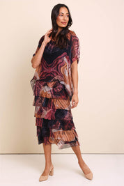 Model Amandam wearing size 10 of the Silk Blend Multi Layers Dress - Blackfloral in colour Blackfloral, from the front
