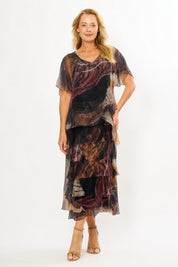 Model Genericm wearing size sample of the Silk Blend Multi Layers Dress - Blackfloral in colour Blackfloral, from the front