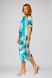 Model Genericm wearing size sample of the Silk Blend Multi Layers Dress - Acquaabstract in colour Acquaabstract, from the front