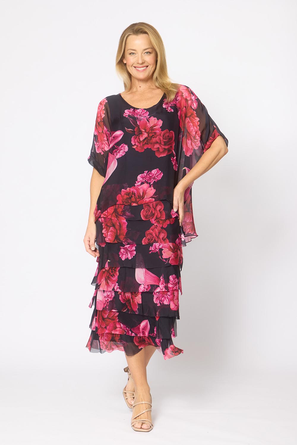 Model Genericm wearing size sample of the Silk Blend Multi Layers Dress - Navypinkflora in colour Navypinkflora, from the front