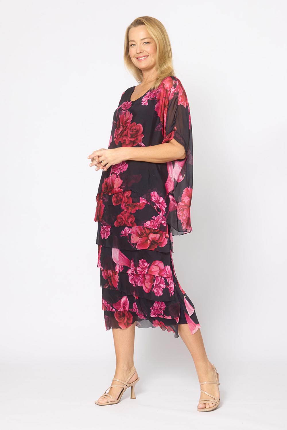 Model Genericm wearing size sample of the Silk Blend Multi Layers Dress - Navypinkflora in colour Navypinkflora, from the front