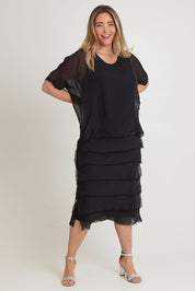 Model Chanel wearing the Silk Blend Multi Layers Dress in colour Black (Black), from the front, showing the whole outfit